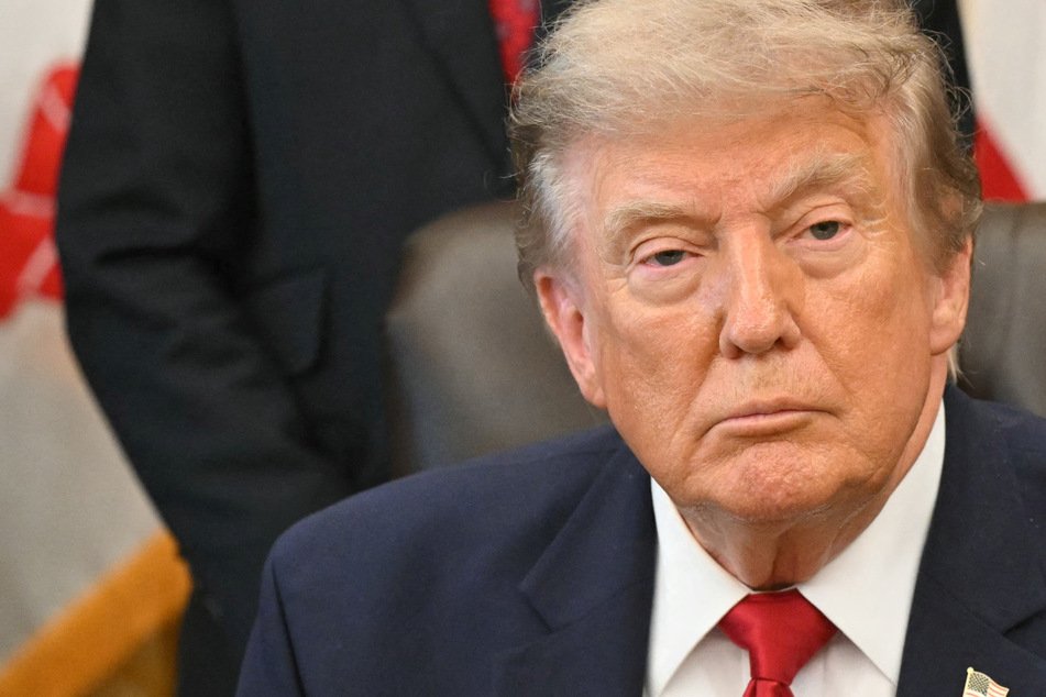Trump quickly backs down on threat to charge ships passing through Strait of Hormuz