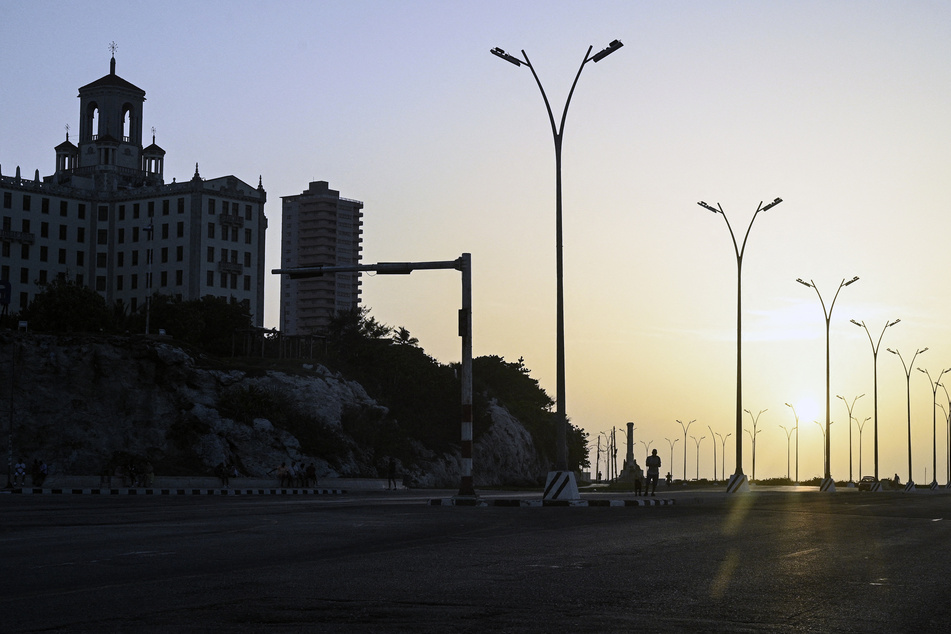 Buildings stand in darkness amid the third nationwide blackout to hit Cuba in less than ten days, triggered by the US' brutal oil blockade.