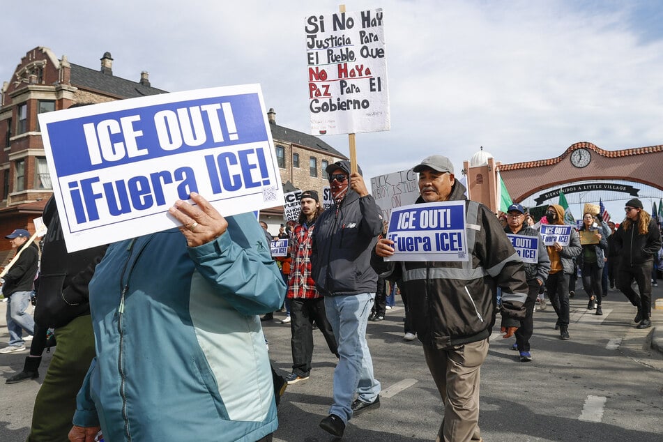 Protesters march against ICE in the Little Village neighborhood of Chicago, Illinois, on October 25, 2025.