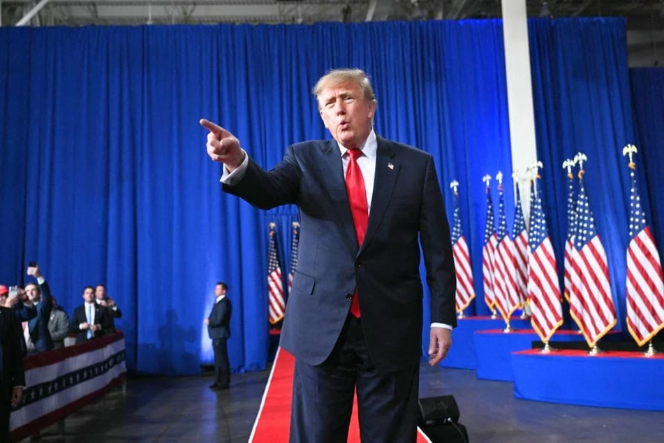 President Donald Trump points as he walks on stage at a midterm election campaign rally at Guardian Centers of Georgia in Perry, Georgia, on October 24, 2026. In a recent speech, President Trump bragged that oil executives have been making billions as Americans continue to pay high gas prices at the pump.