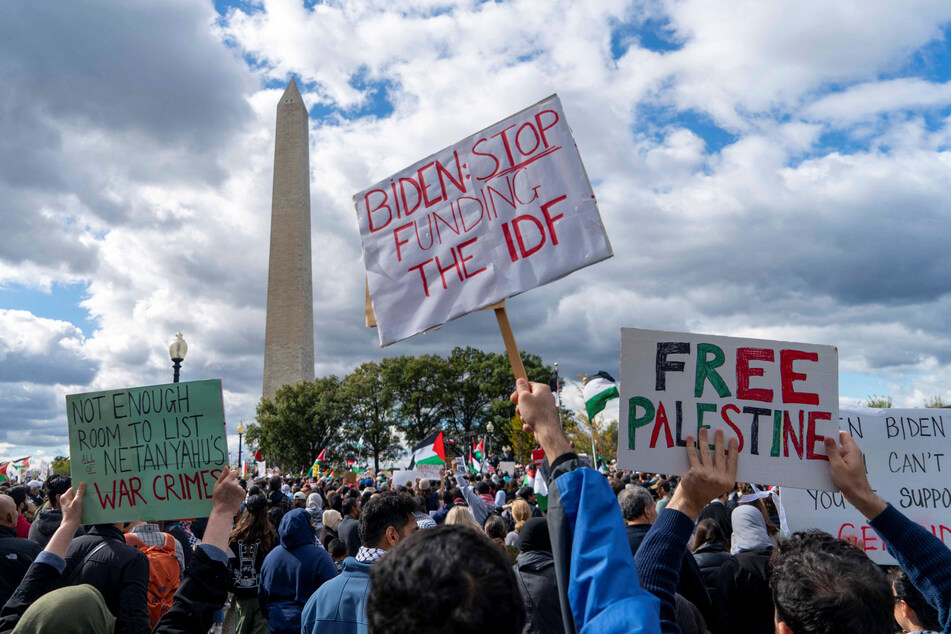 Protesters rally for a ceasefire and an end to US funding for the Israeli military at the Washington Monument in Washington DC.