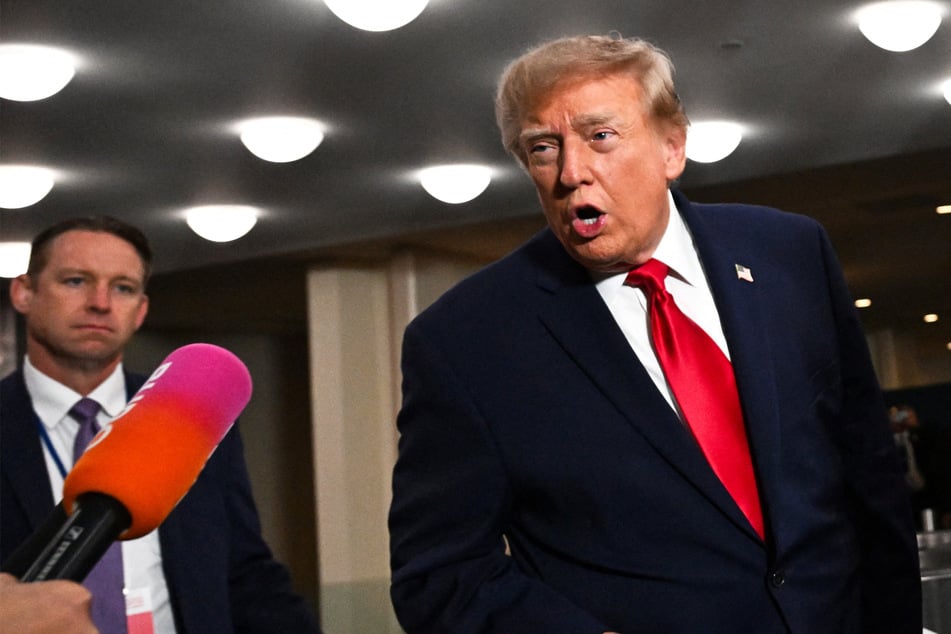 President Donald Trump speaks to the media as he arrives for the 81st session of the United Nations General Assembly. The Department of Justice has expressed support for his free press ban.
