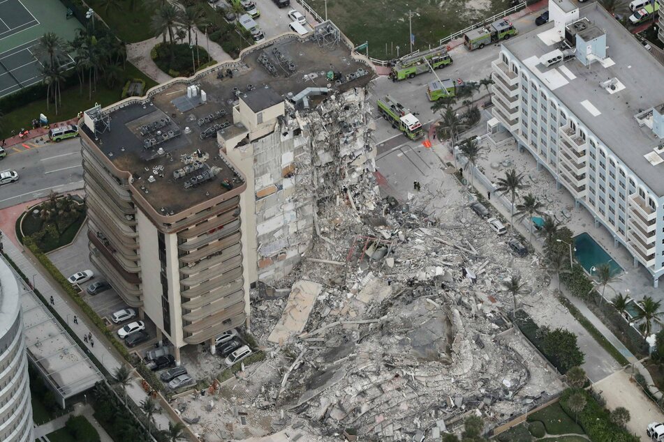 An aerial view showed the 12-story oceanfront Champlain Towers South Condo that collapsed around 2AM on Thursday.