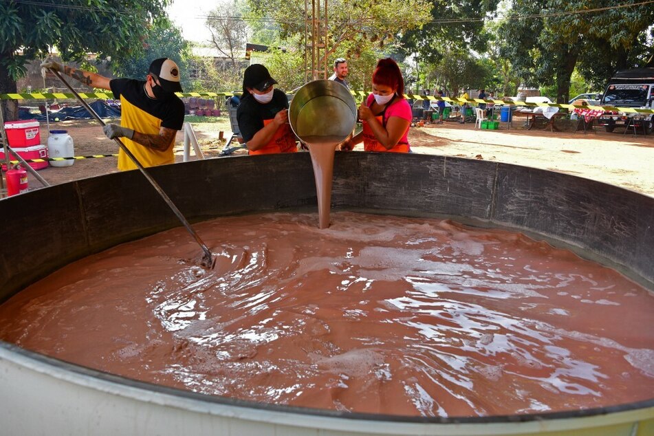Firefighters called in after two people fall in chocolate tank at M&M's factory