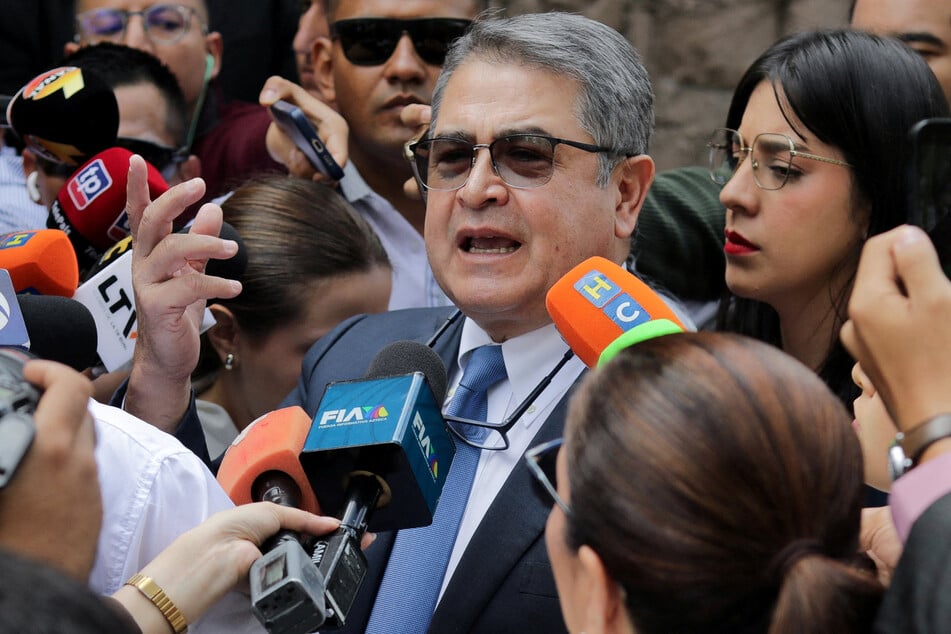 Honduran ex-leader pardoned by Trump to remain free amid corruption trial