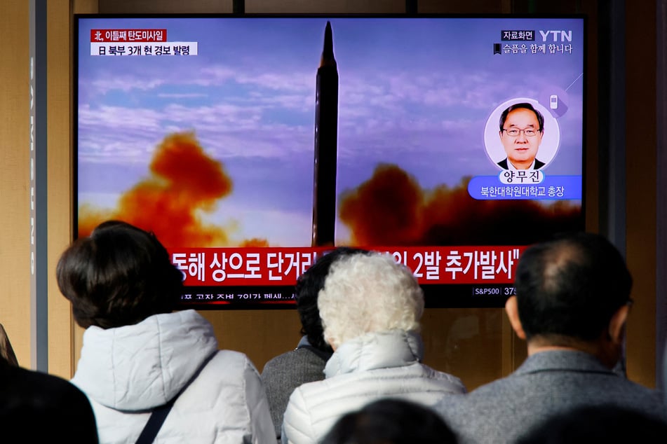 People in Seoul, South Korea, watch a TV broadcasting a news report on North Korea firing a ballistic missile off its east coast.