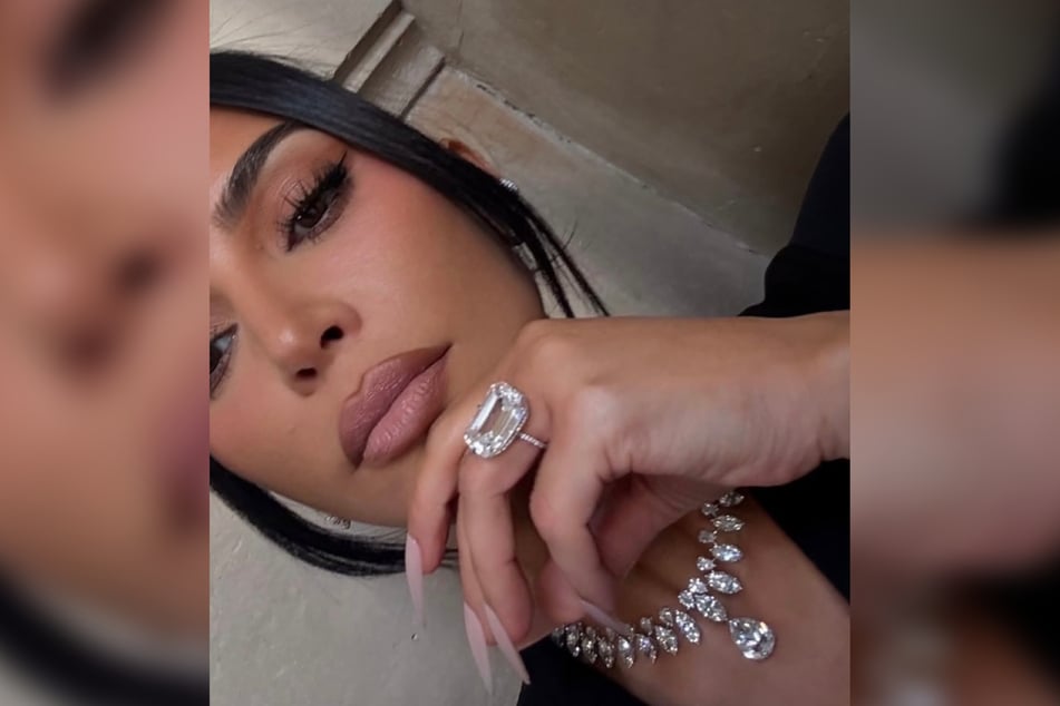 Kim Kardashian included a photo of a massive diamond ring in her latest series of selfies.