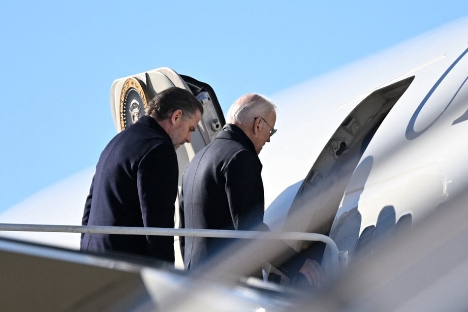 A former FBI informant charged with lying about President Joe Biden (r.) and his son, Hunter Biden, has been arrested again.