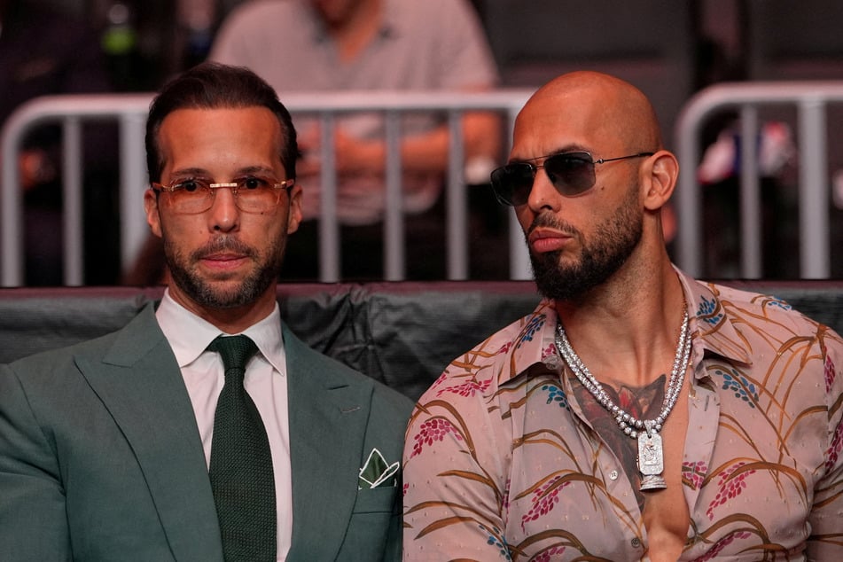 Andrew Tate (r.) and Tristan Tate (l.) arrive before President Donald Trump to attend UFC 327 at Kaseya Center in Miami on April 11, 2026. The two brothers remain locked up since their arrest in July.