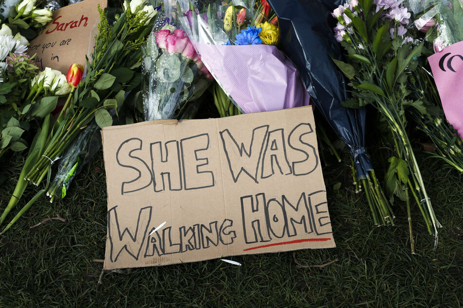 Flowers and notes paid tribute to Sarah Everard in Parliament Square in London.