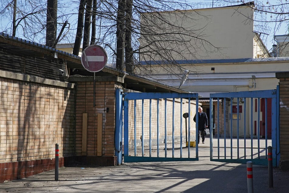 A man walks out of the pre-trial detention center Lefortovo, where Evan Gershkovich is being held on espionage charges.