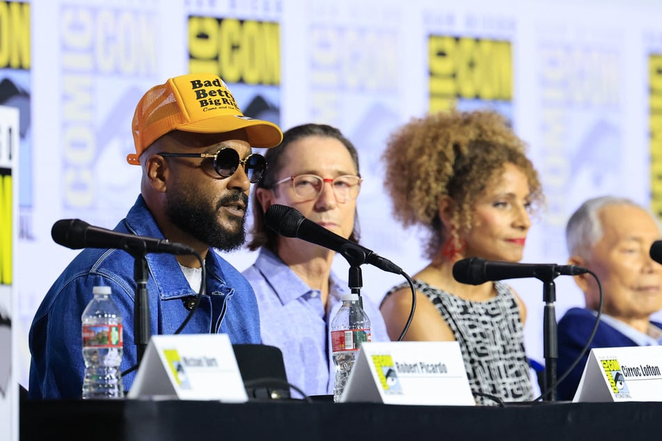 From l. to r.: Cirroc Lofton, Dominic Keating, Michelle Hurd, and George Takei attend the 2026 Comic-Con International: San Diego - Star Trek Universe Hall H Panel on July 25, 2026