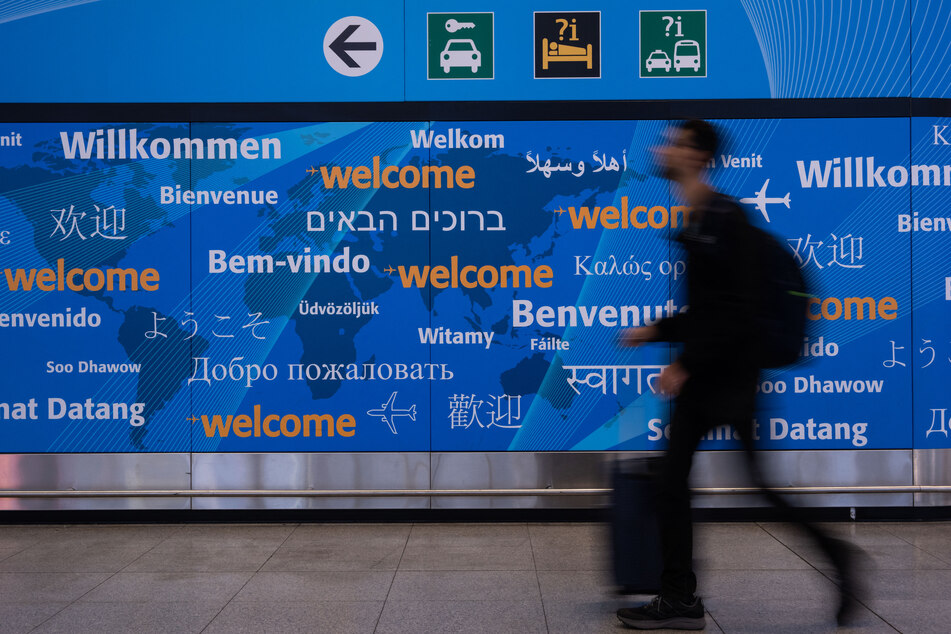 Trump's travel ban on 12 countries officially takes effect as Democrats vow to fight back