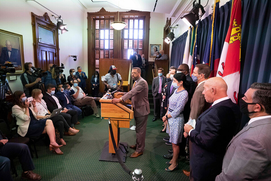 State Senator Borris Miles shows support for his colleagues who broke quorum on July 21, 2021.