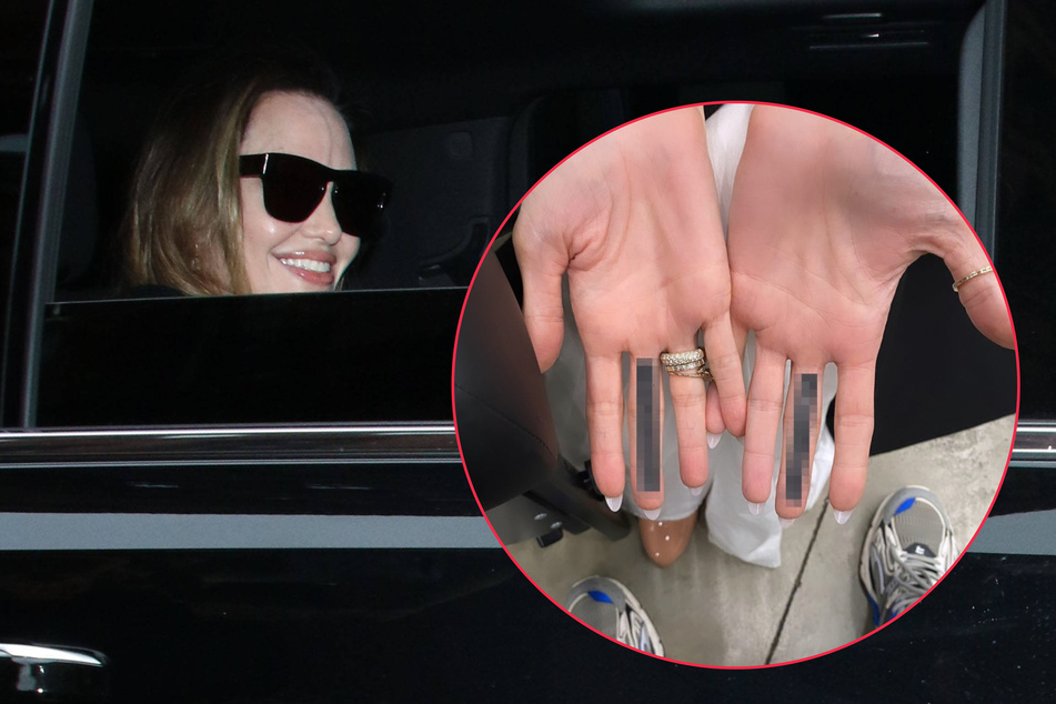 Is Angelina Jolie giving Brad Pitt the middle finger with her latest tattoos?
