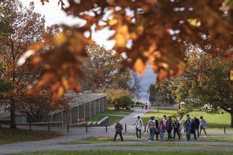 A tour group is led through the Cornell University campus on November 3, 2023. Numerous public figures have spoken out against the university for failing to properly punish the men involved in the alleged rape.