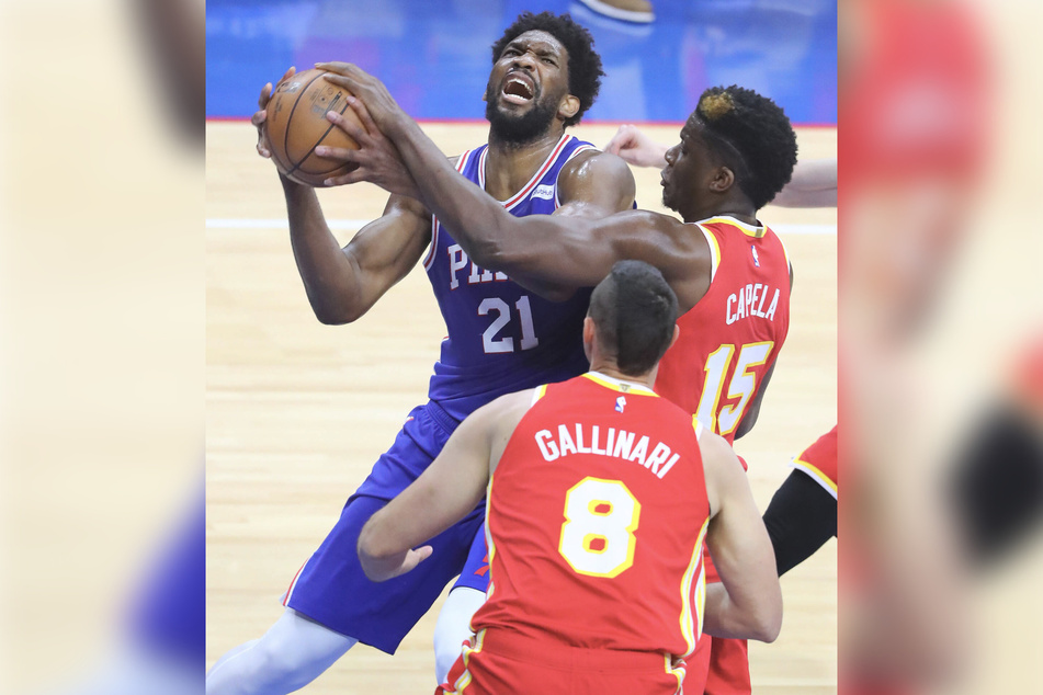 Joel Embiid of the 76s scored a career play-off high with 40 points and 13 rebounds.