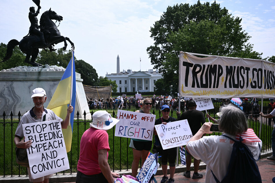 Demonstrators across the US gathered Thursday for May Day rallies against Donald Trump, protesting his administration's policies and attempts to push the limits of presidential power.