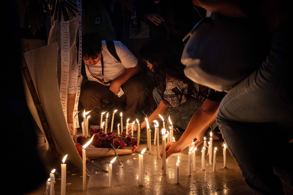 Philippines says two US citizens were among 19 people killed in anti-communist raid
