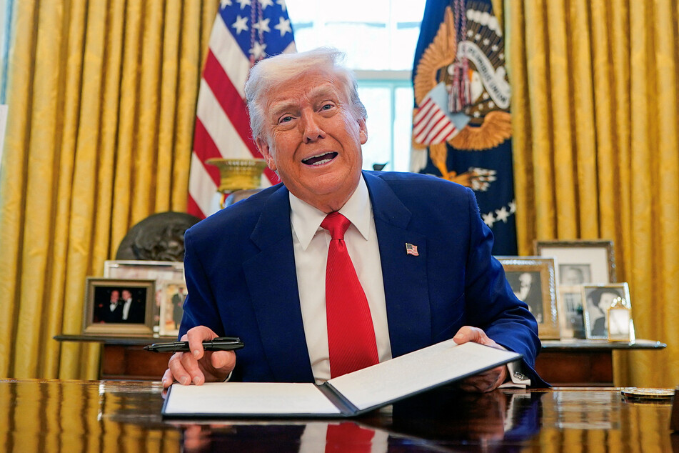 President Donald Trump speaks as he signs executive orders and proclamations in the Oval Office of the White House on April 9, 2025.