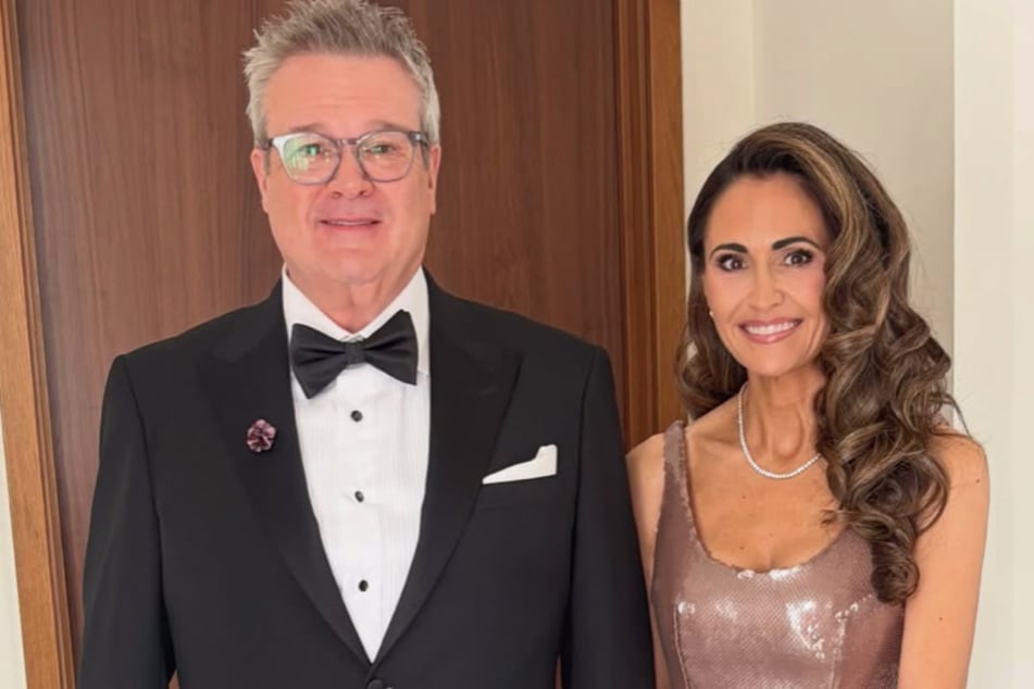 Eric Stonestreet (l) attended the buzzy wedding with his wife Lindsey.