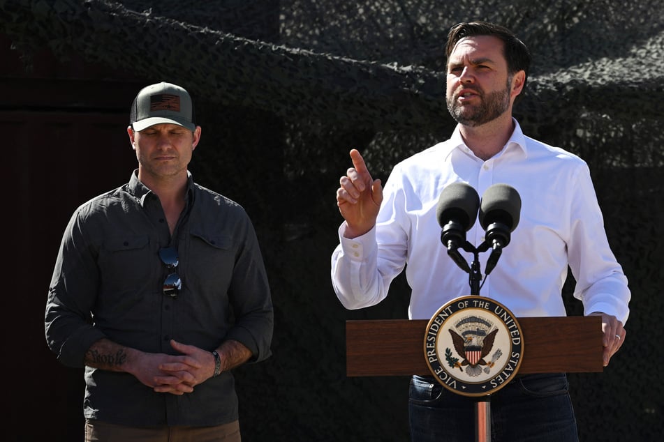 Vice President JD Vance (r.) speaks to the press as he tours the US-Mexico border at Eagle Pass, Texas, on March 5, 2025.