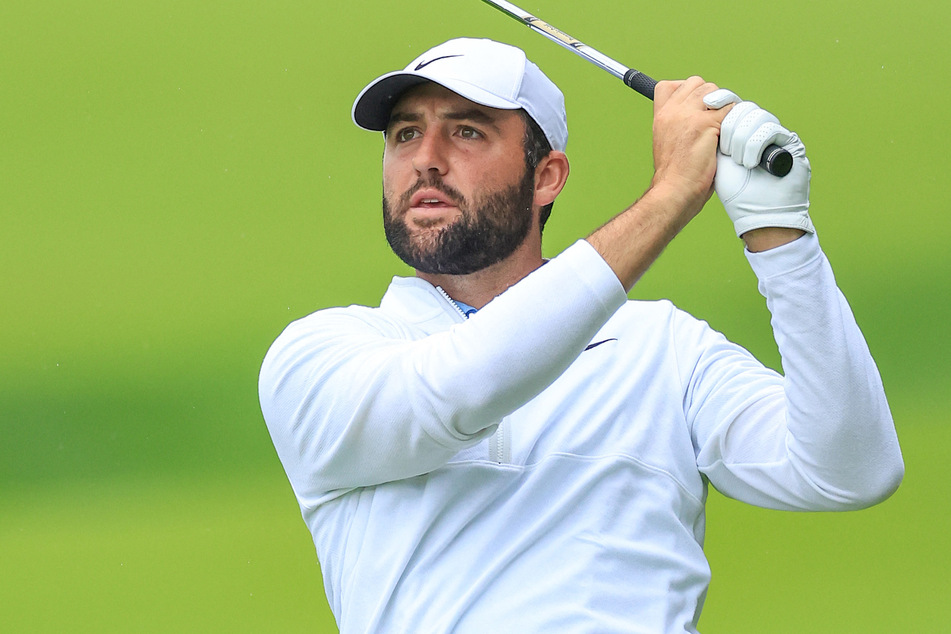 Golf world number one Scottie Scheffler was handcuffed and arrested by police early Friday outside the PGA Championship at Valhalla.