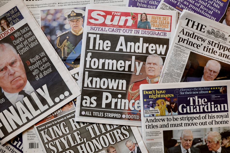The front pages of most of Britain's national newspapers are pictured in a spread created in London on October 31, 2025. The younger brother of King Charles was stripped of his royal titles last year.