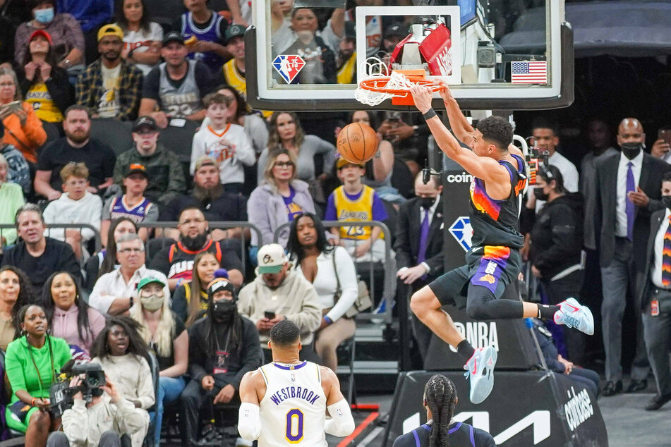 NBA roundup: LeBron makes history while Suns torch Lakers, Durant snatches win for Nets