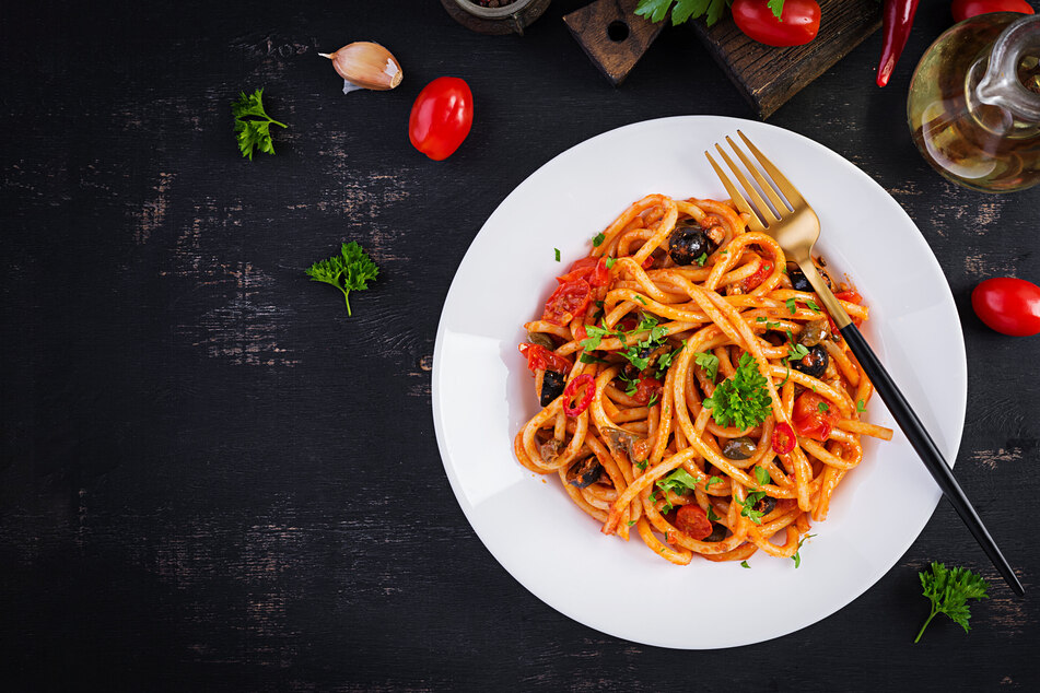 Discover how to make pasta puttanesca in this quick, easy, and cheap recipe.