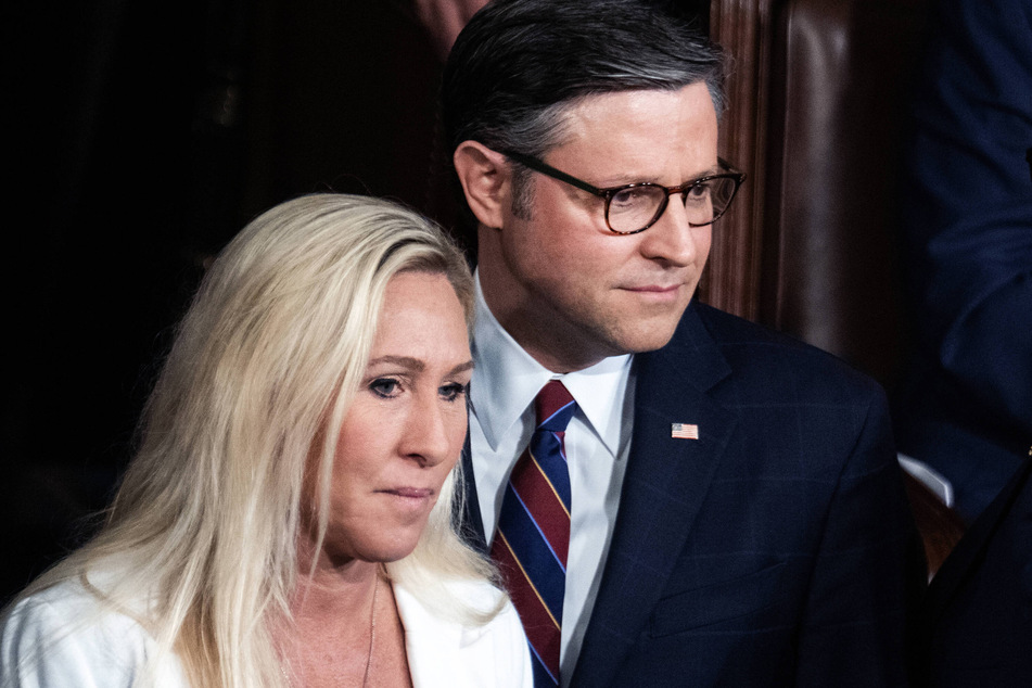House Speaker Mike Johnson (r.) and Rep. Marjorie Taylor Greene (l.) seen on the House floor before a joint meeting of Congress in Washington DC on April 11, 2022.