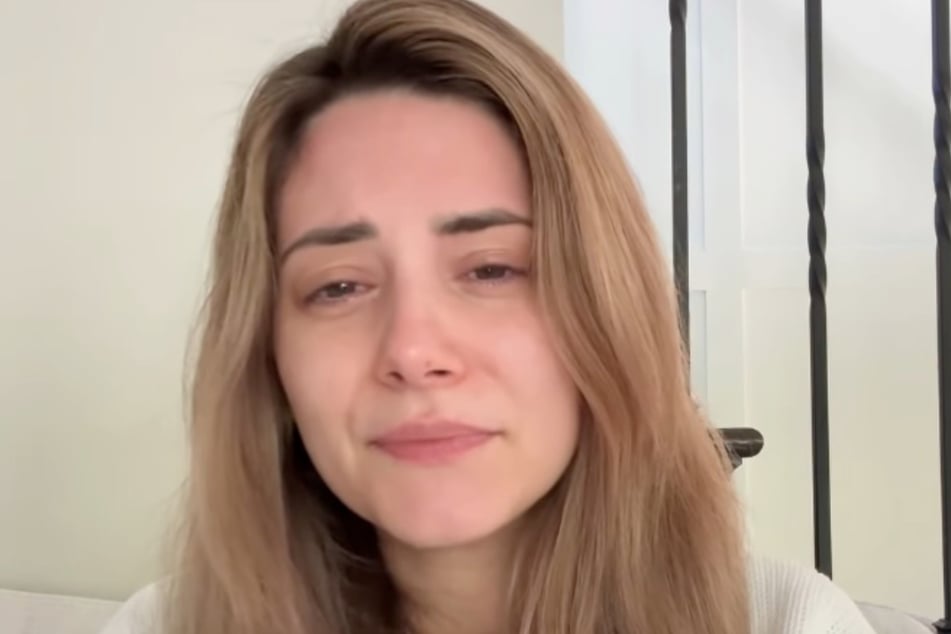 Tucker's fans don’t know her like this: dog mom Courtney Budzyn appears without makeup, in tears.