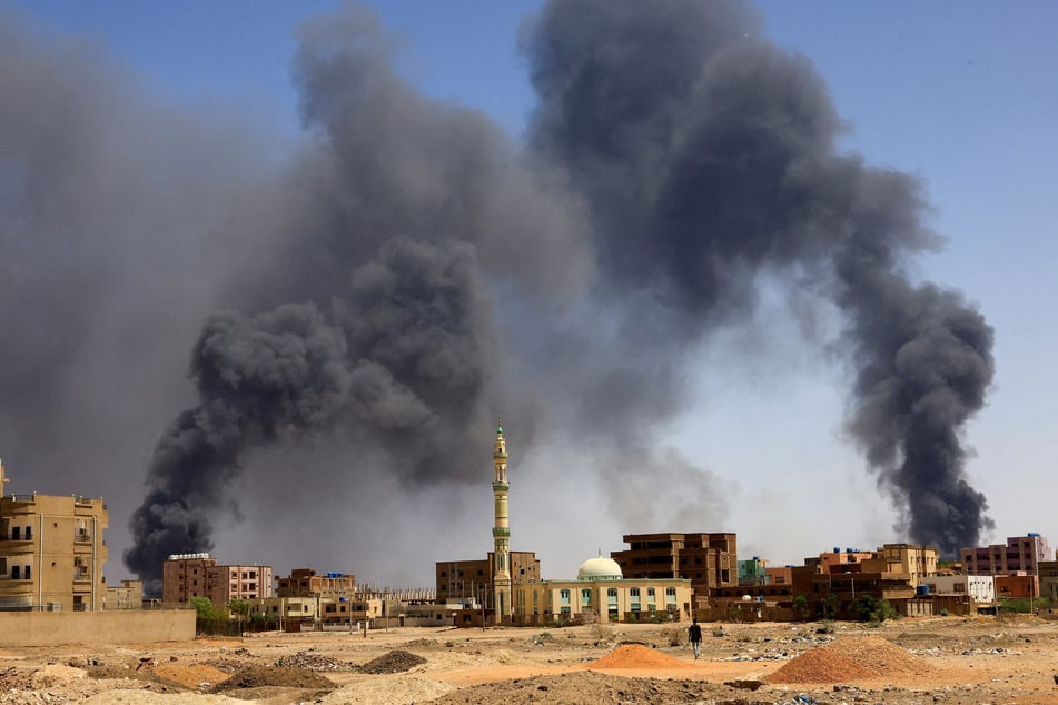 Smoke rises above buildings after aerial bombardment, during clashes between the paramilitary Rapid Support Forces and the army in Khartoum North, Sudan.