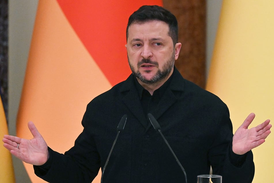 Ukraine's President Volodymyr Zelensky speaks during a press conference following talks with Germany's Chancellor following talks in Kyiv on Sunday. Zelensky told reporters that the US is seeking to lead a new round of talks to end Russia's invasion.