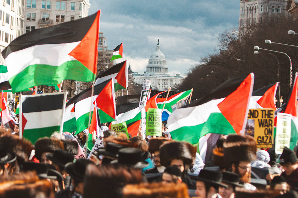 Palestinians call for "justice and liberation" ahead of unprecedented Biden genocide hearing