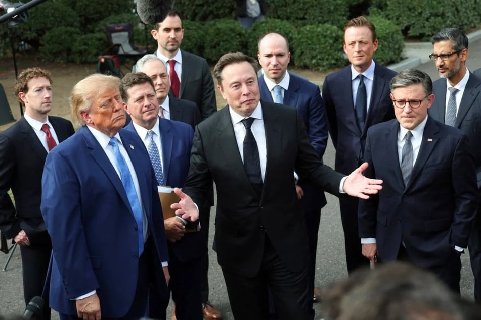 Elon Musk (c.) alongside President Donald Trump (l.) and tech leaders during a press briefing at the White House on September 29. In a new post, Musk urged users to embrace Trump's push for AI to be rebranded as "super intelligence."