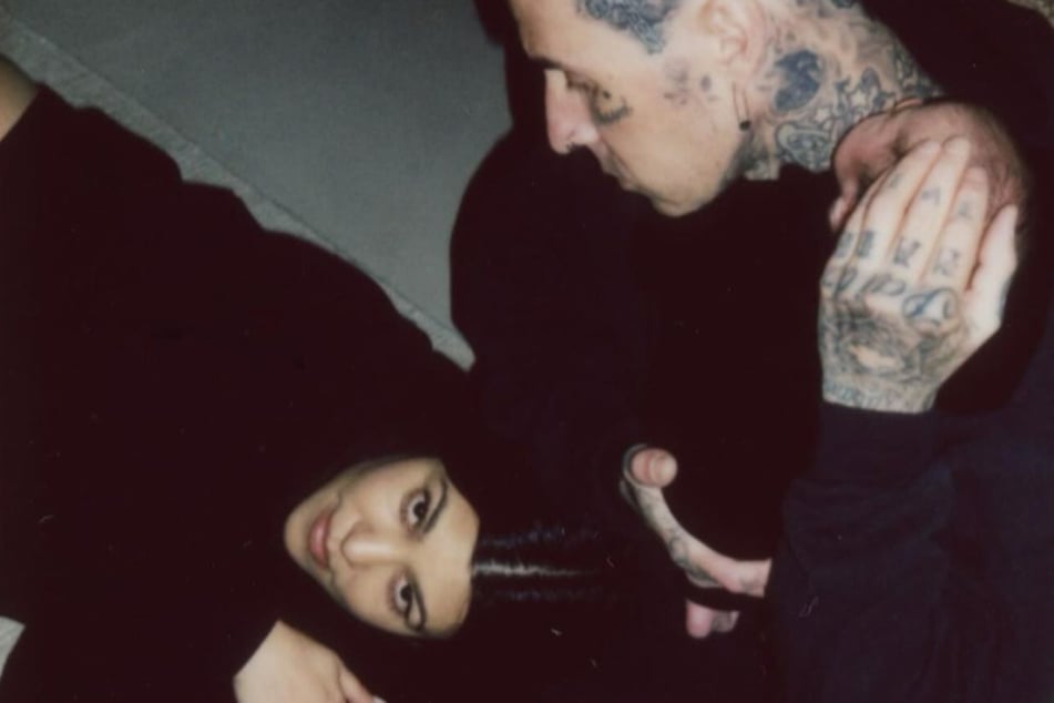 Kourtney Kardashian (l.) and Travis Barker (r.) gave the world a sneak peek at their baby boy Rocky Thirteen Barker.