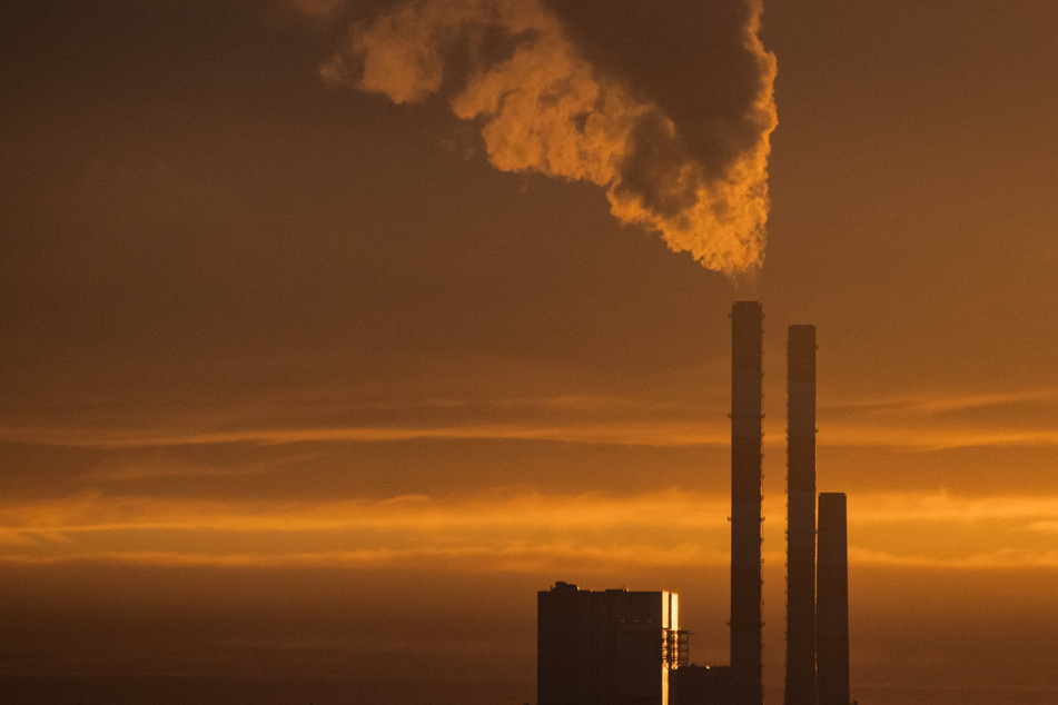 Only 40 of the world's 100 largest private firms have set net-zero carbon emissions targets to fight climate change, according to a report released Monday.