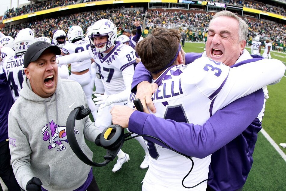 Head coach Sonny Dykes of the TCU Horned Frogs celebrated with his team after just narrowly defeating the Baylor Bears 29-28 on Saturday.