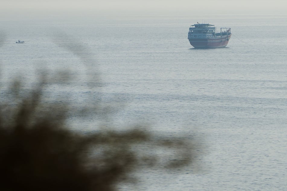 A vessel in the Strait of Hormuz, as seen from Musandam, Oman, on July 31, 2026.