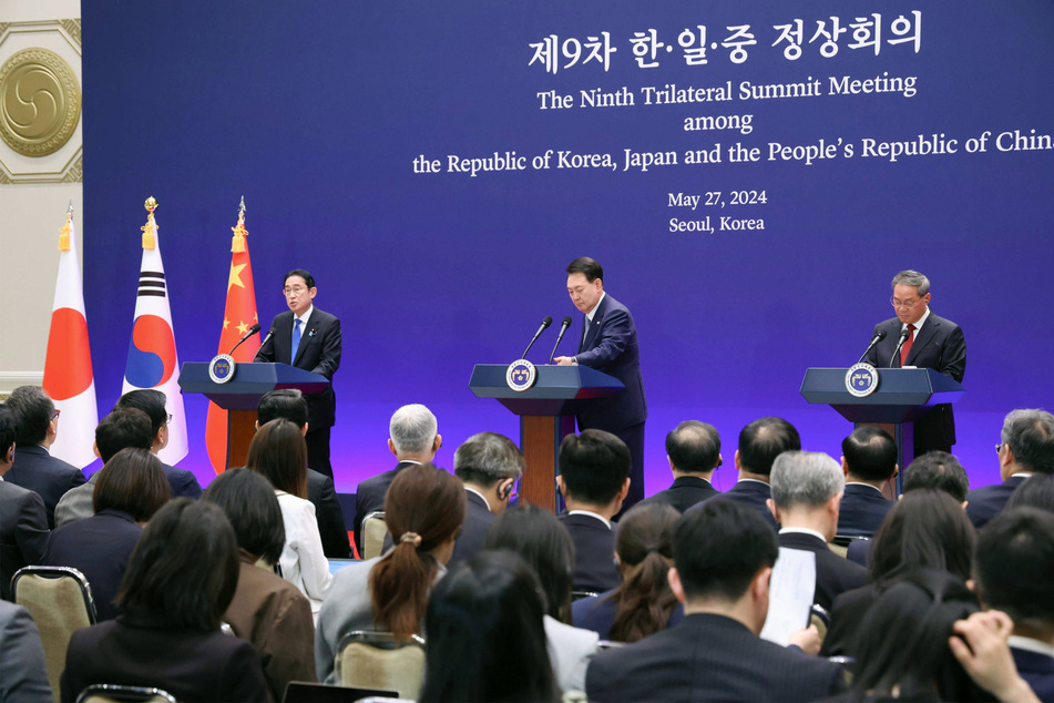 The trilateral summit hit an early snag when North Korea announced it would be launching a spy satellite mere days before talks took place.