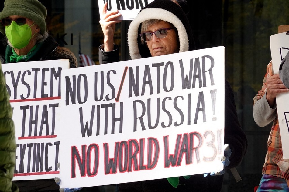 Peace activists call for deescalation of tensions between nuclear powers during a demonstration in Chicago, Illinois.