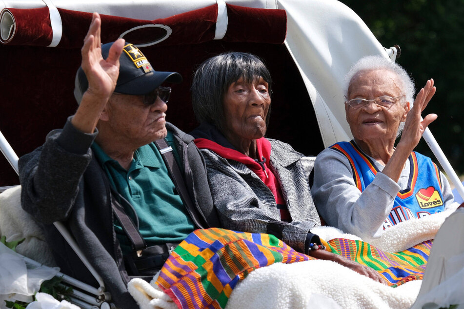 Tulsa Race Massacre survivors Viola Ford Fletcher (r.) and Lessie Benningfield Fletcher (c.) are seeking to reverse the dismissal of their historic reparations case. Fellow survivor Hughes Van Ellis (l.), who helped bring the suit, passed away in October 2023.