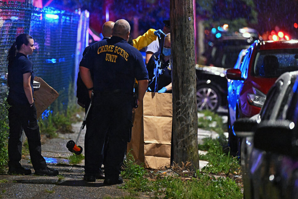 Authorities, who said they "have absolutely no idea why [the shooting] happened," arrested two suspects in connection with the incident.