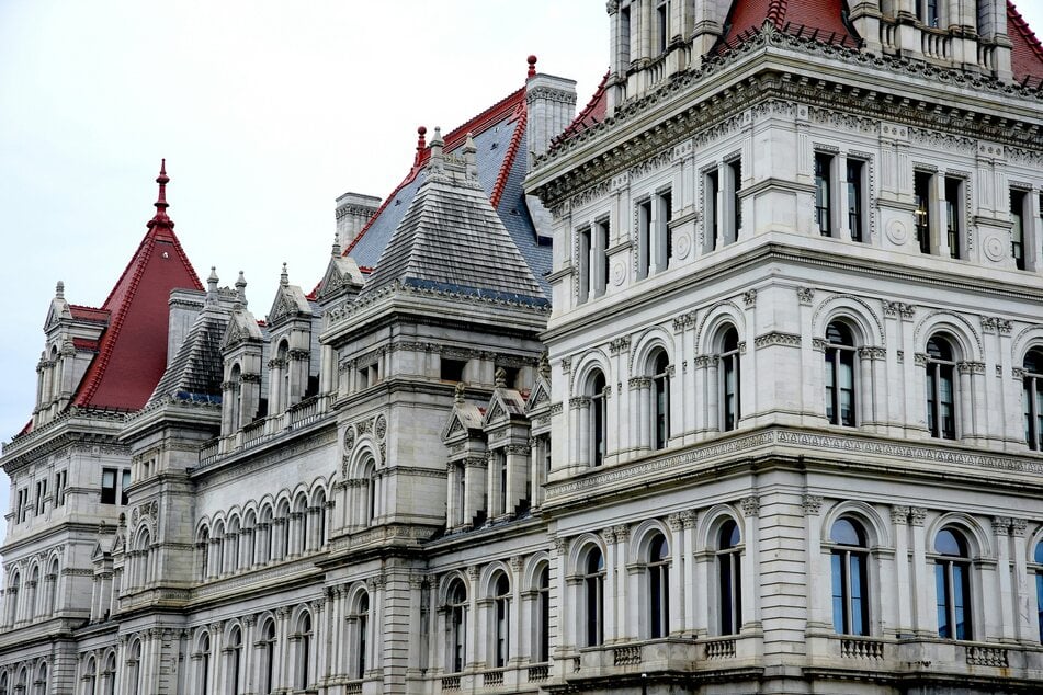 Authorities charged a woman who allegedly supported the Islamic State group with a terrorism offense Thursday after she told an FBI informant she "wanted to destroy" the New York State Capitol buildings (pictured), per court filings.
