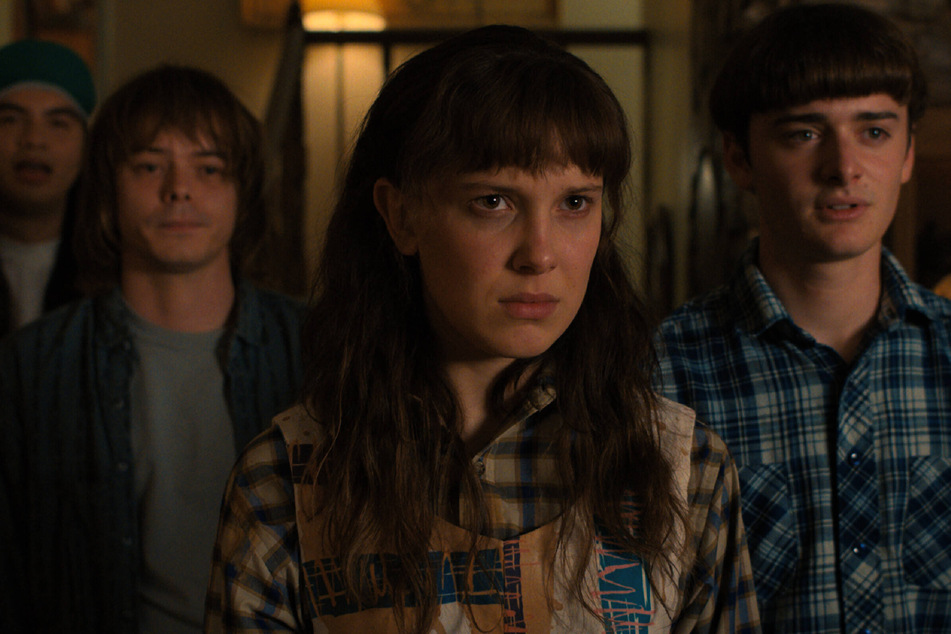 Millie Bobby Brown (c.) will return as Eleven for the fifth and final season of Netflix's Stranger Things.