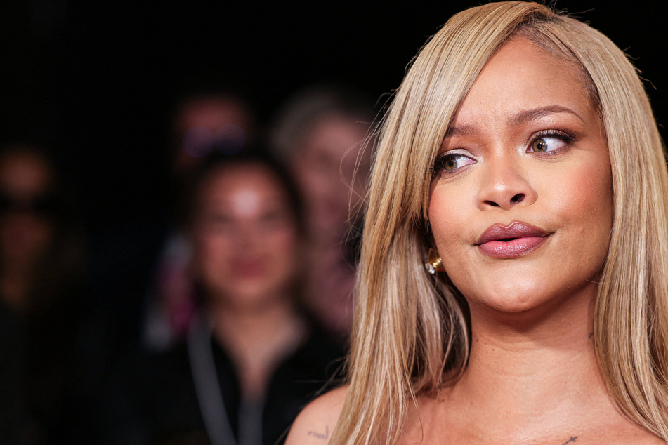 Rihanna was out and about in New York City, trolling fans who have been patiently waiting for new music from the makeup mogul with an "I'm retired" t-shirt!