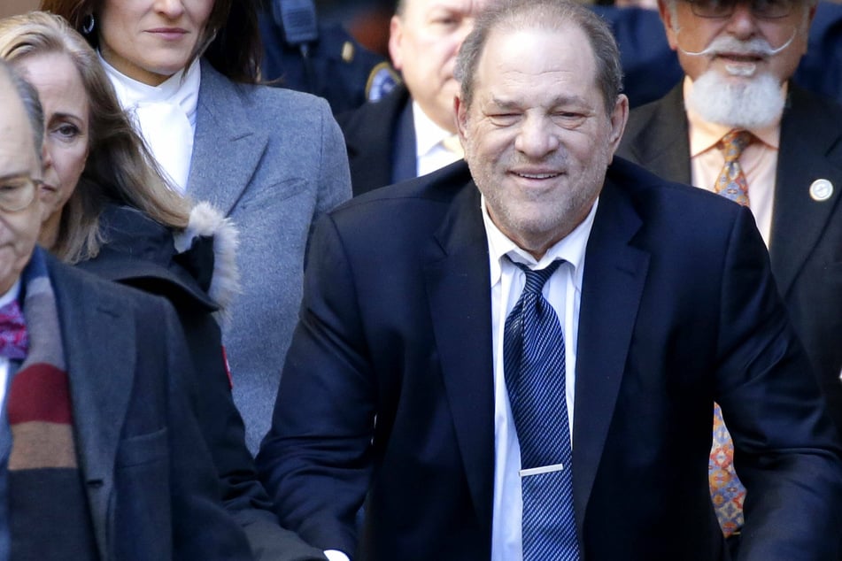 Harvey Weinstein exits Manhattan Supreme Court after day four of deliberations in his rape trial in February.