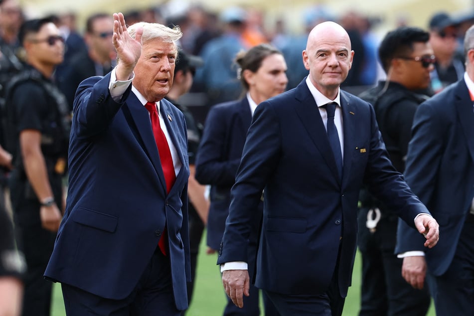 FIFA President Gianni Infantino (r.) and US President Donald Trump (l.) arrive for the ceremony after the 2026 World Cup final at the New York/New Jersey Stadium.