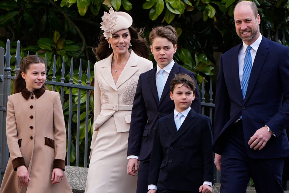 (From l. to r.) Princess Charlotte, Princess Kate, Prince George, Prince Louis, and Prince William are all avid soccer fans.